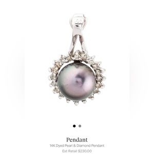 14K white gold pendant with 0.08 carats of single cut diamonds,